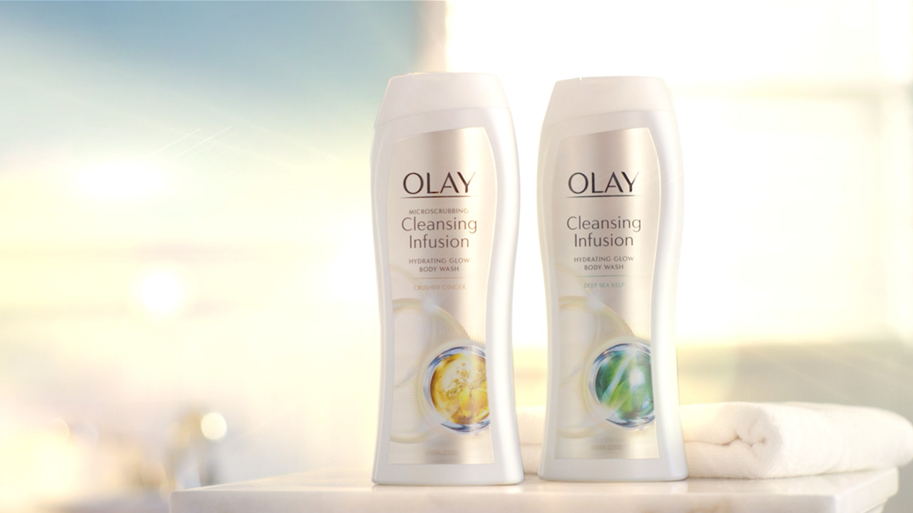 sữa tắm cho mùa hè Olay Microscrubbing Cleansing Infusion Hydrating Glow Body Wash With Crushed Ginger