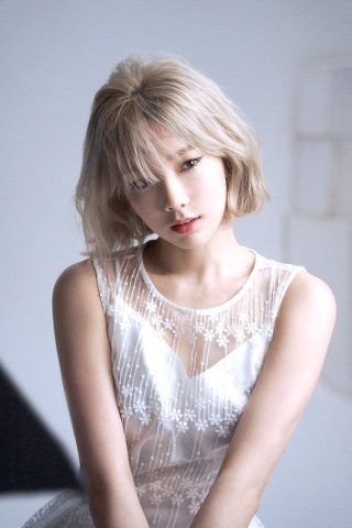Cô nàng trưởng nhóm SNSD đang diện kiểu tóc ngắn xoăn sóng Hàn Quốc